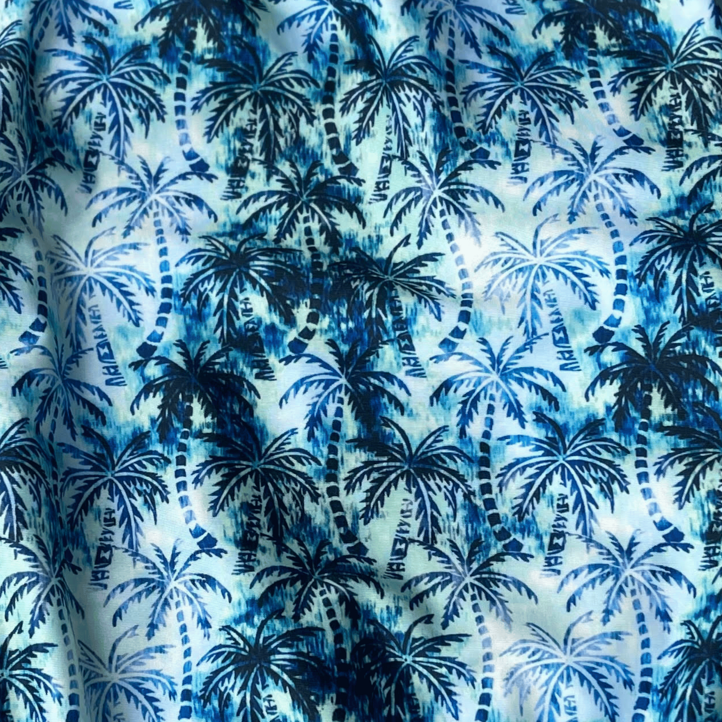 Extra Life Fastback Swimsuit in Hawaiian Haze Design on Pale Aquamarine