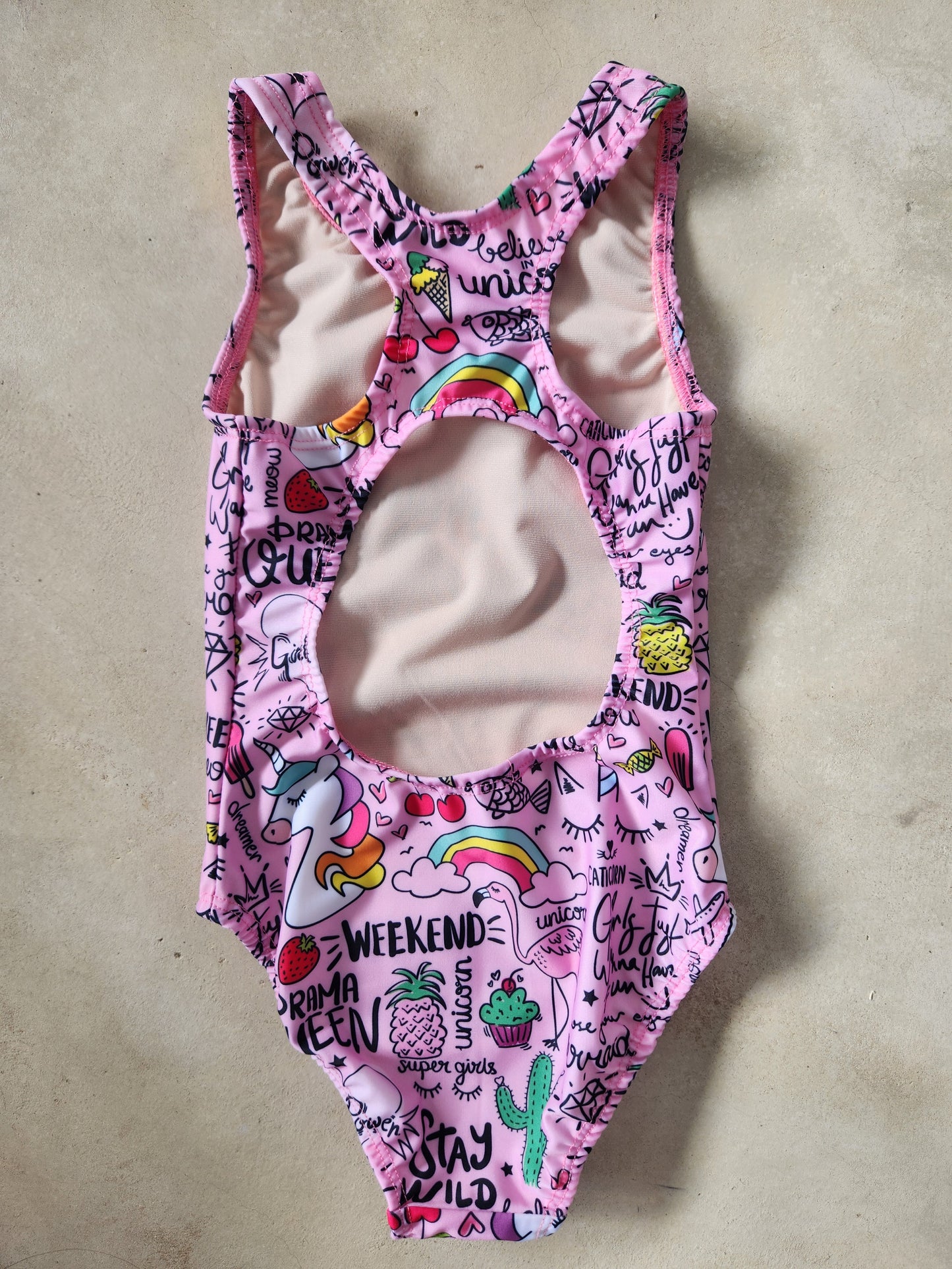 Kikx Extra Life Fastback Swimsuit in Unicorn and Summer Theme on Light Pink